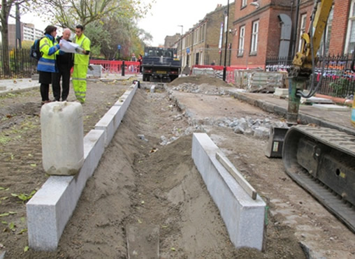 Figure 11: Lining up the rain gardens. Working back from the lowest point to attain enough fall (November 2013)