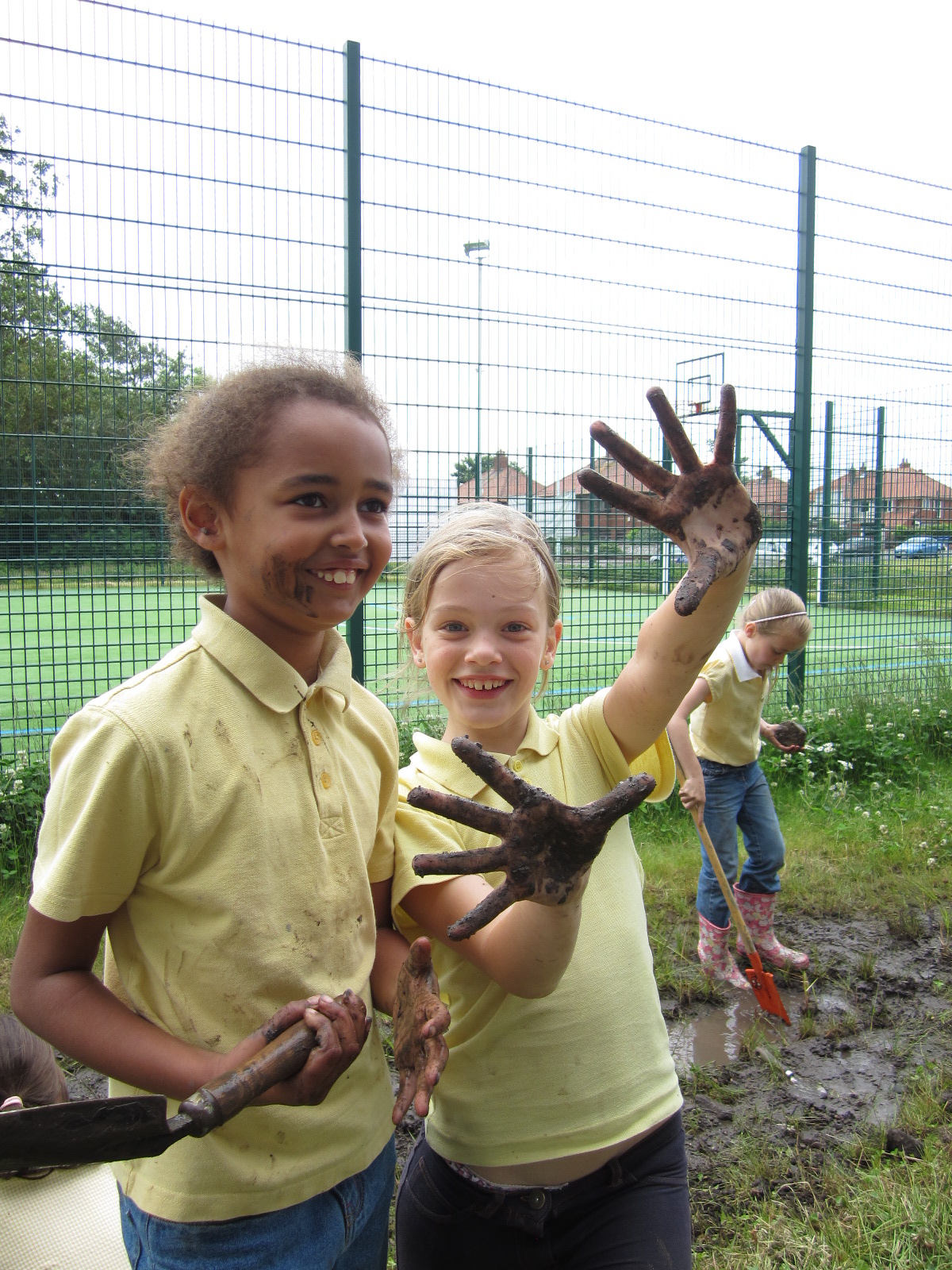 Children playing in a SuDS component