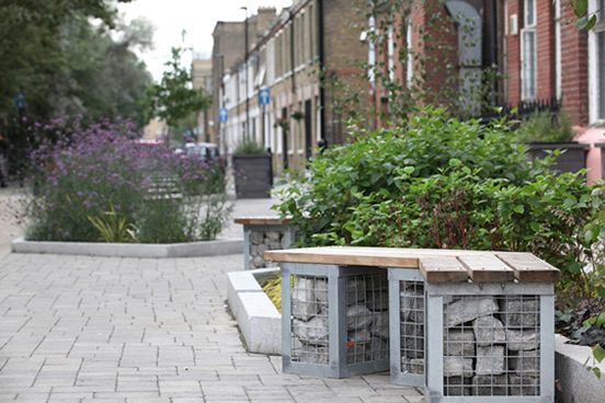 Figure 17: Gabion bench filled with granite setts excavated from the road, August 2014